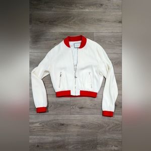 Red and White zip up jacket. Alexis